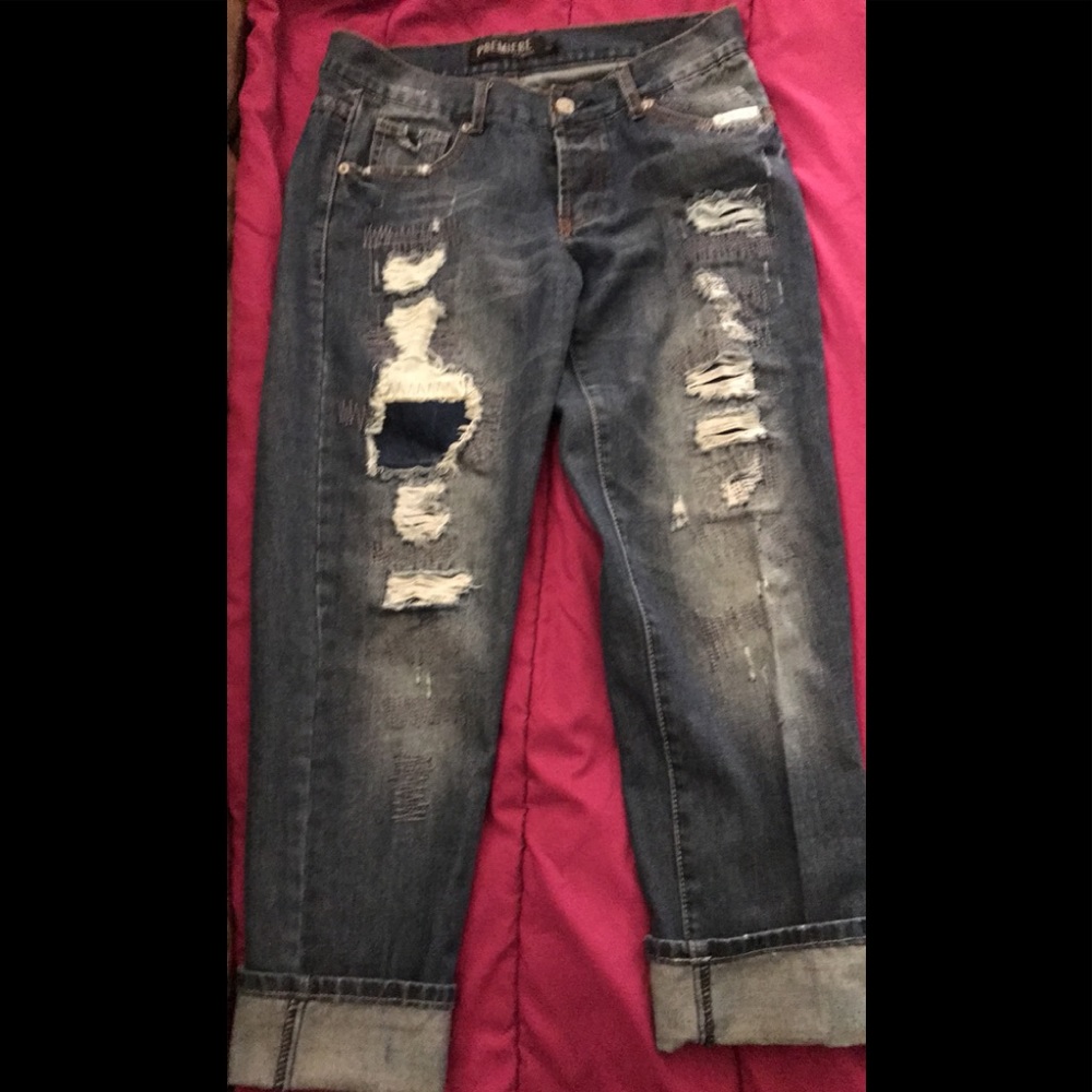 Dark washed, distressed jeans
