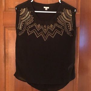 Black top with gold details