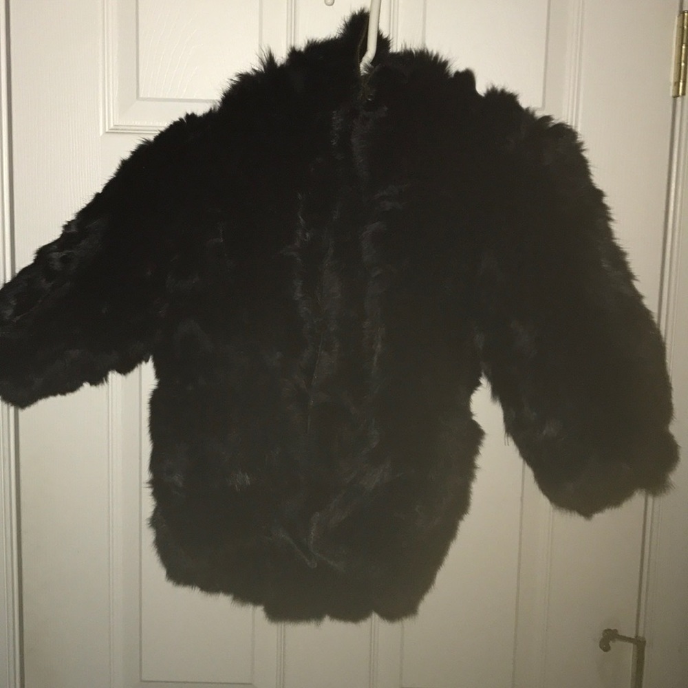 Kids fur coat. Size 3xl but is cut small.