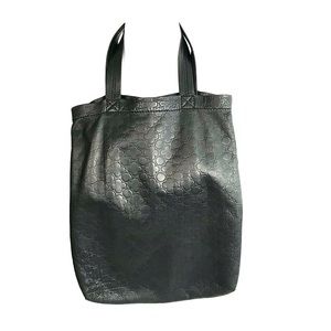Comme des Garcons leather, clover embossed tote
