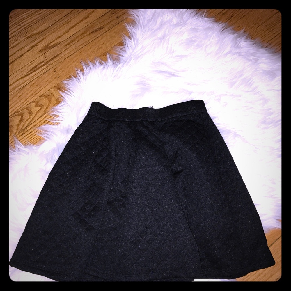 A black checkered skirt
