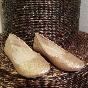 FREE w/. Little girl's gold ballerina style shoes