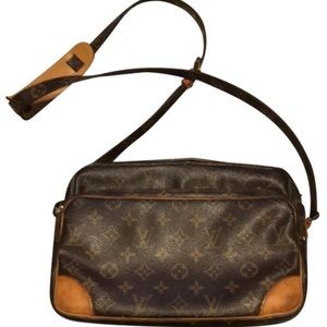 Authentic Louis Vuitton Nile Cross Body bag
