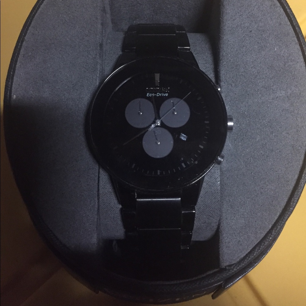 All black Citizen eco drive watch...