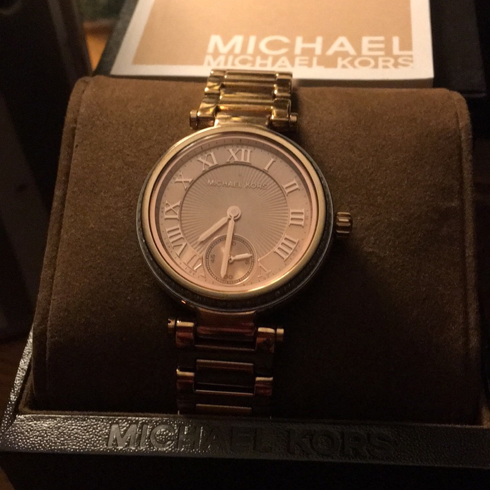 Micheal kors rose colored lady's watch