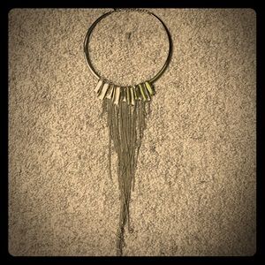 Choker with fringe details.