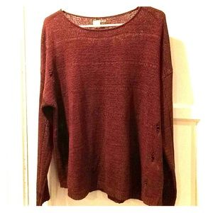 Distressed/ripped knit sweater