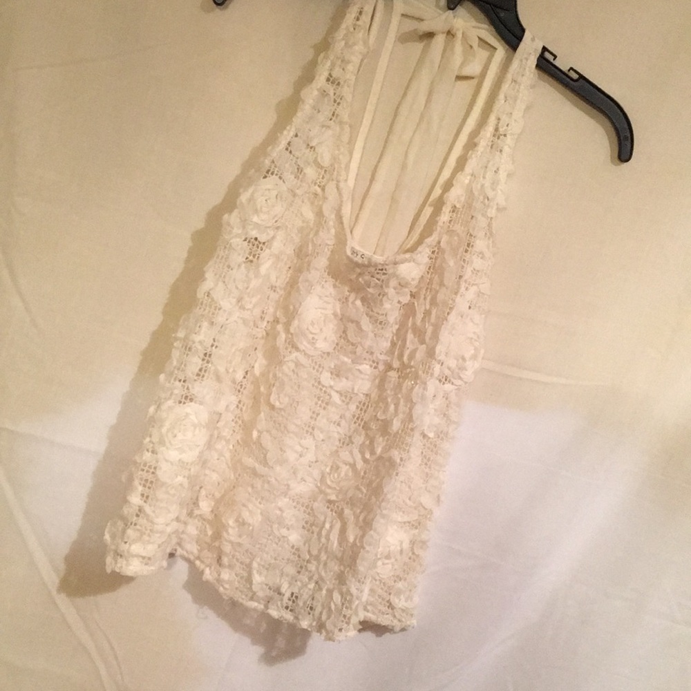 Beautiful ivory top with gorgeous front detail.