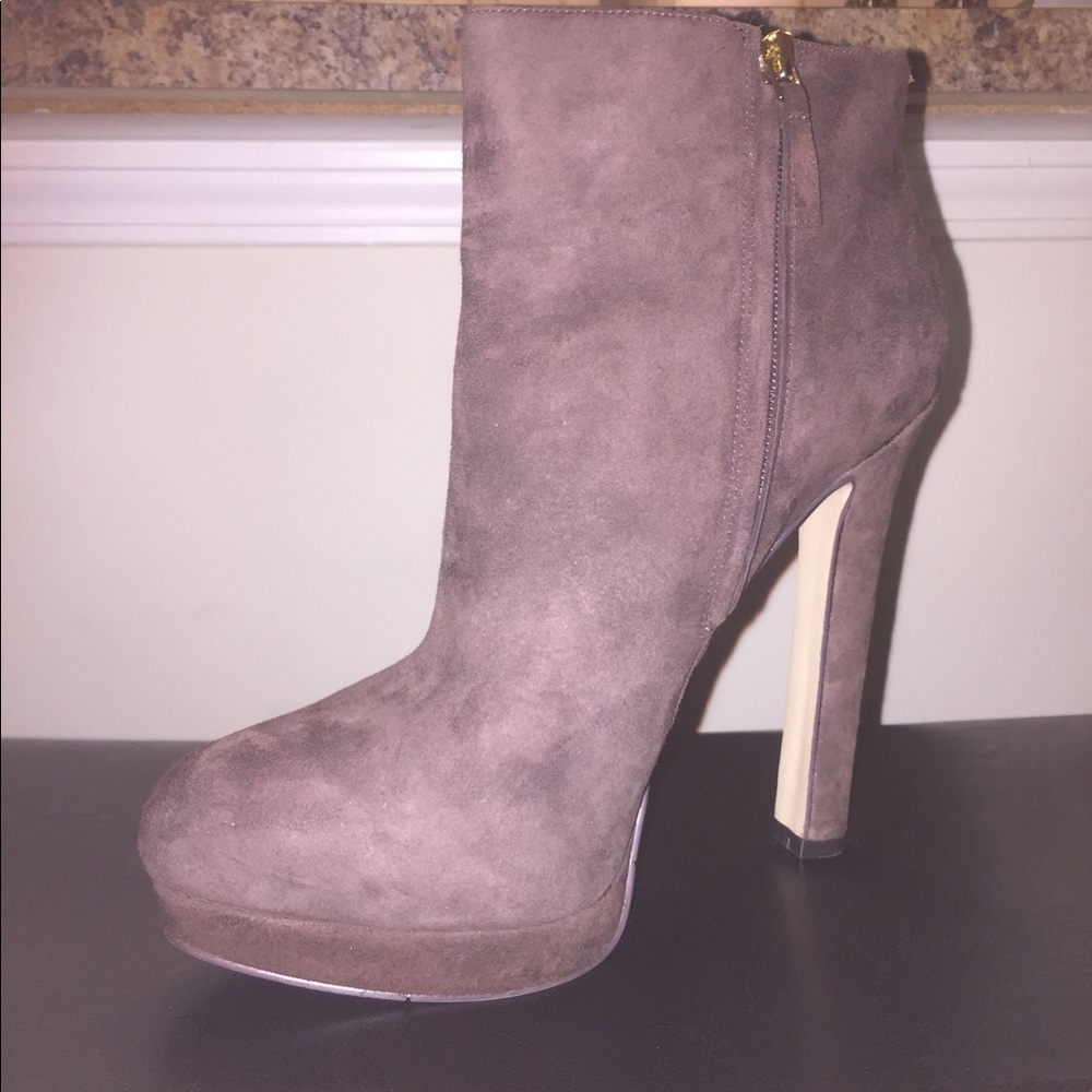 Chocolate brown suede bootie. Wore 2 times. New