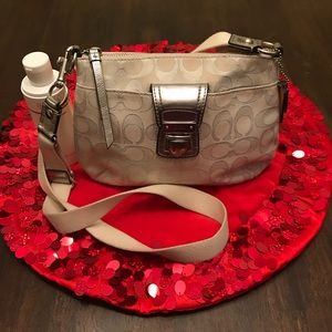 Coach white and silver crossbody bag with cleaner