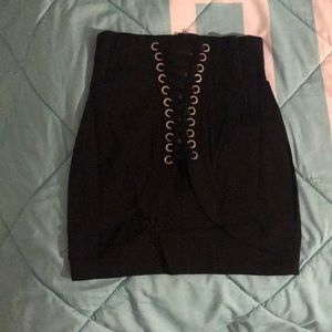 Brand new black skirt with laced up front
