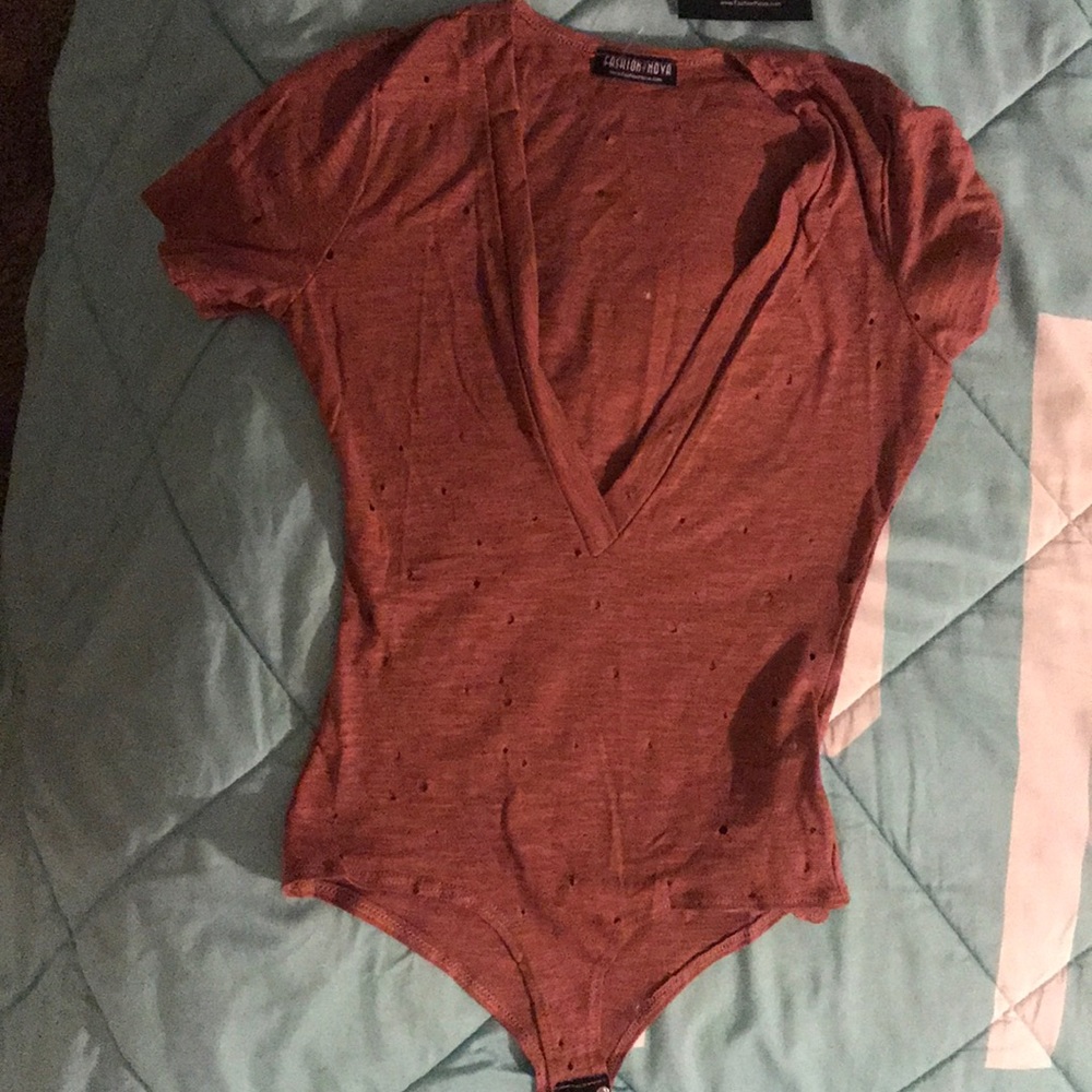 Brand new low v cut onesie