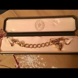 Women’s gold Juicy Couture bracelet