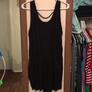 Black romper with no back. Size L.