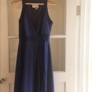 Navy Blue flowing short sleeve wrap dress. Size 6
