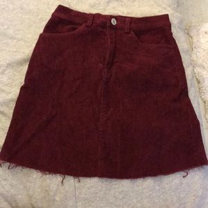 A burgundy skirt