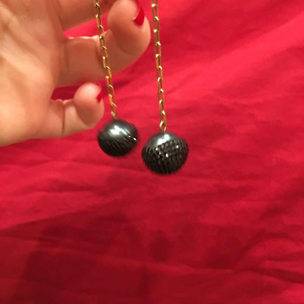 Swarovski earrings.