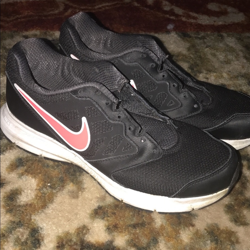 Women’s black and pink Nike’s