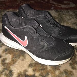 Women’s black and pink Nike’s