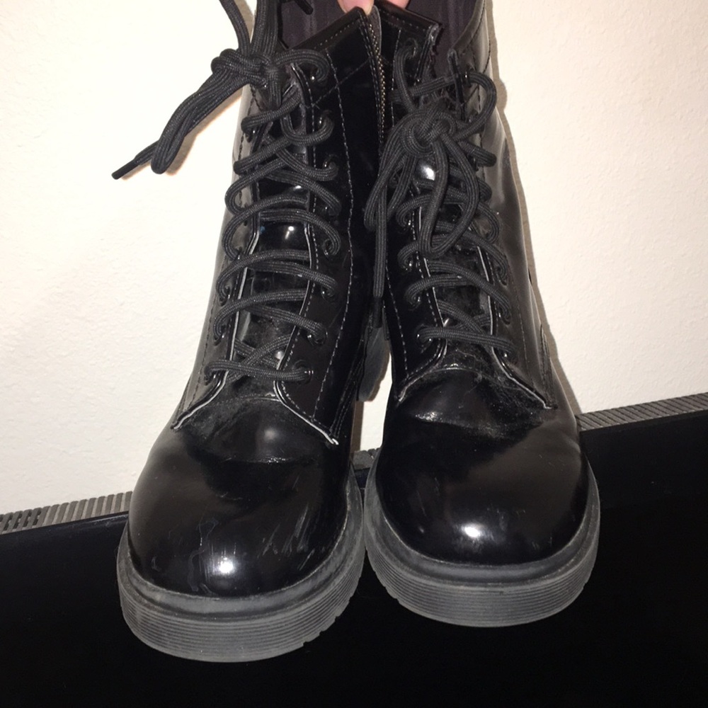 Black glossy combat boots