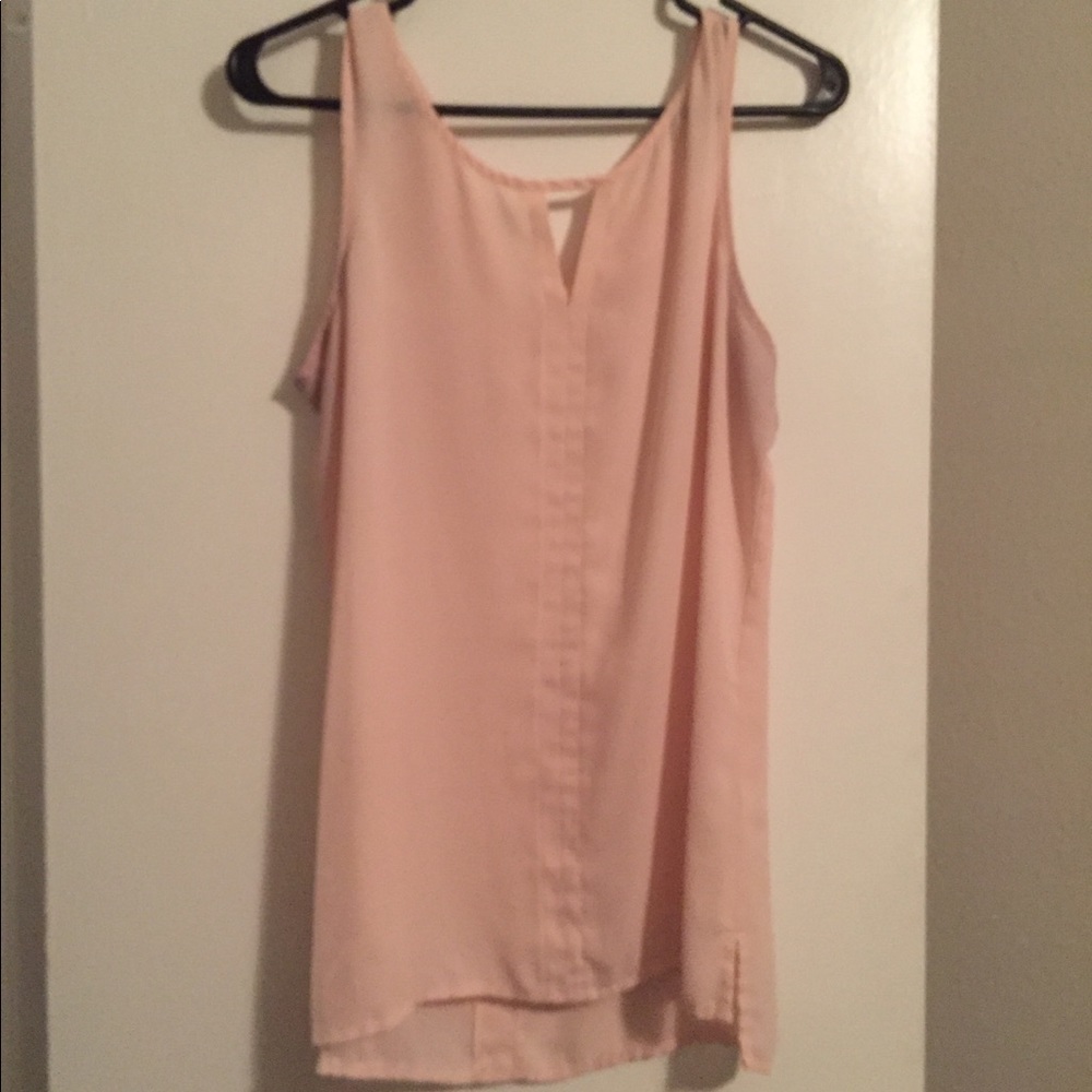 Peach sleeveless blouse