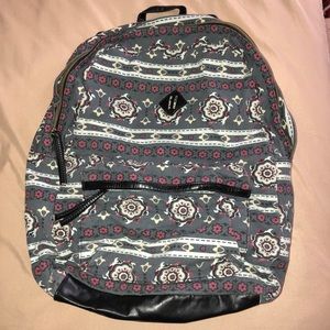 Leather strapped backpack