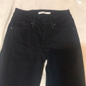 Women’s black high waisted denim Levi jeans