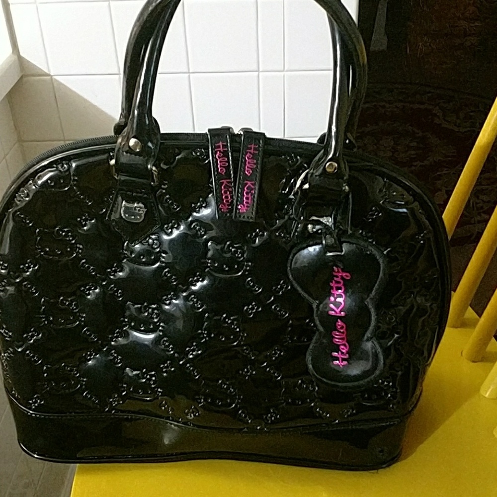 Black patent leather oval shape Hello Kitty handba