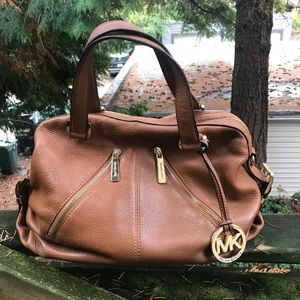 Michael Kors brown leather handbag.