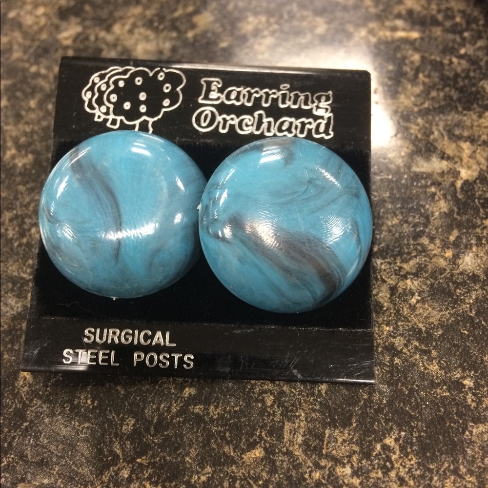 Teal earrings with swirl of black