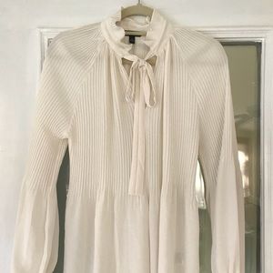 PRICED TO SELL! Cream pleated peplum blouse!