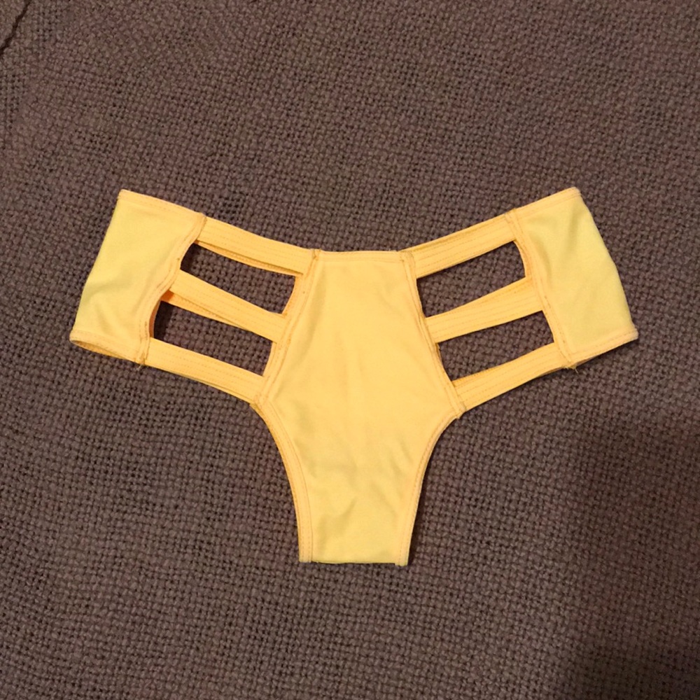 Yellow rave booty shorts