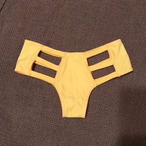 Yellow rave booty shorts