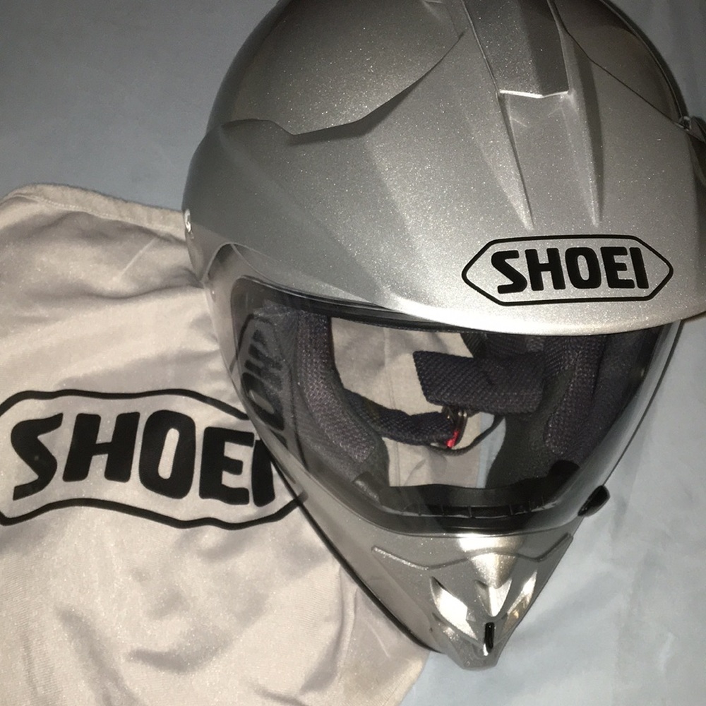 Silver Shoei motorcycle helmet