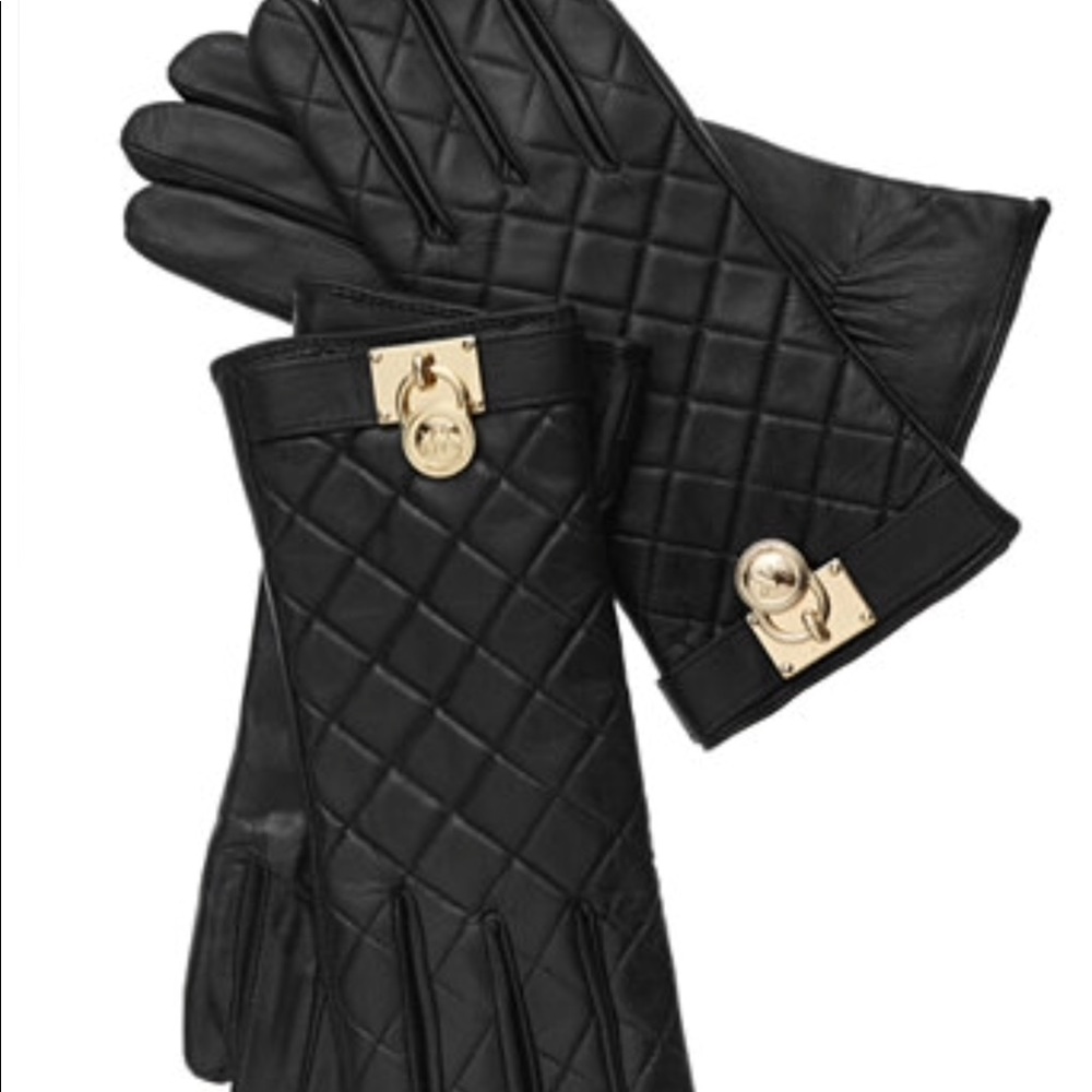 Michael Kor's black leather quilted gloves.