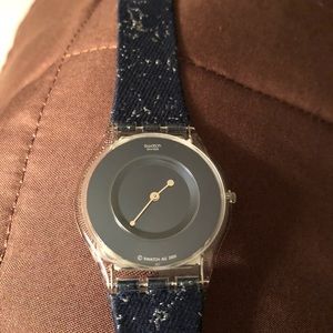 Swatch watch. Dark blue face. Dark blue strap