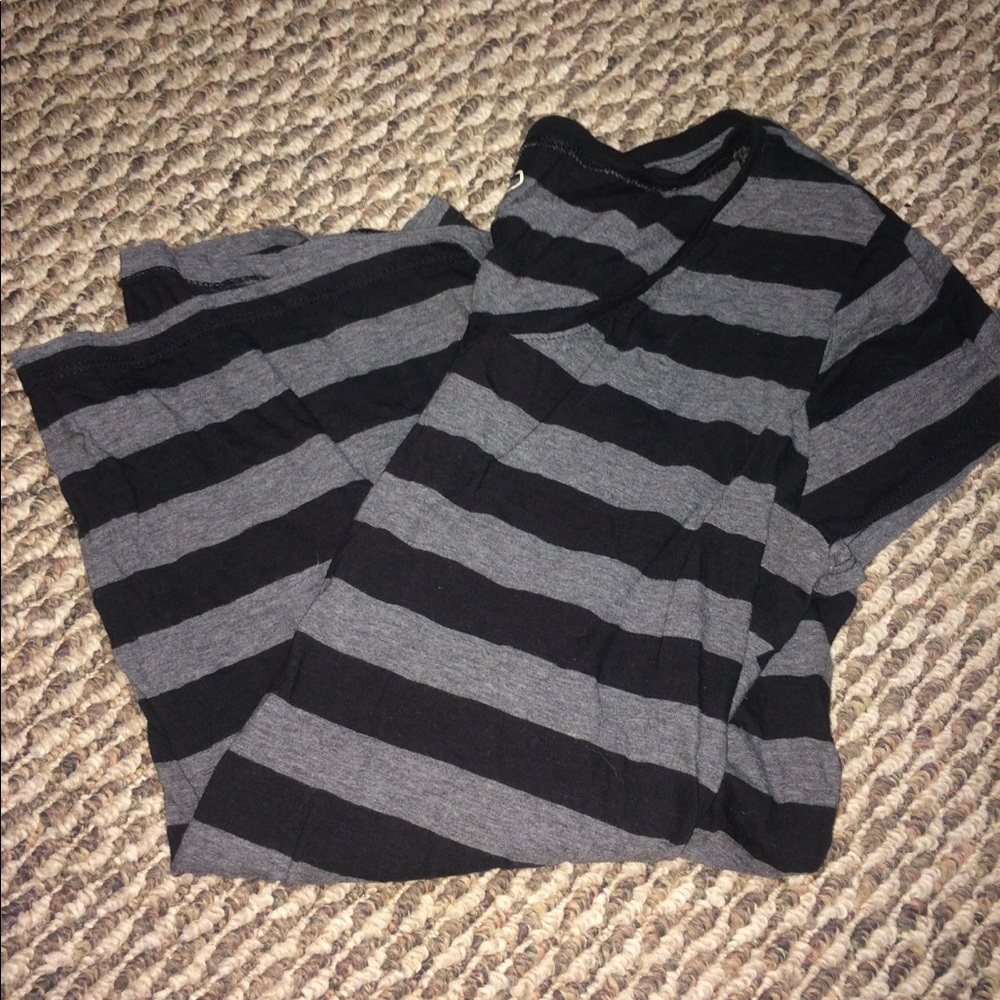 Black and grey striped v neck shirt.