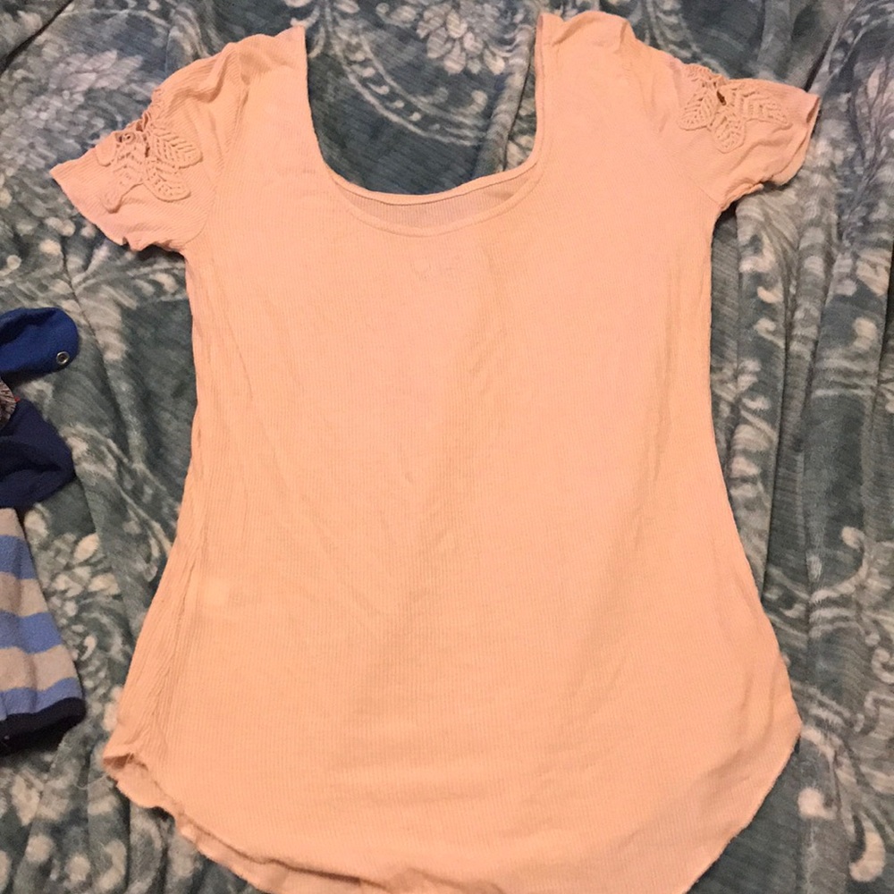 Orange shirt looks different in pictures
