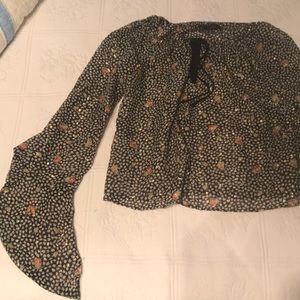 Cinched bell sleeve top with gold accents