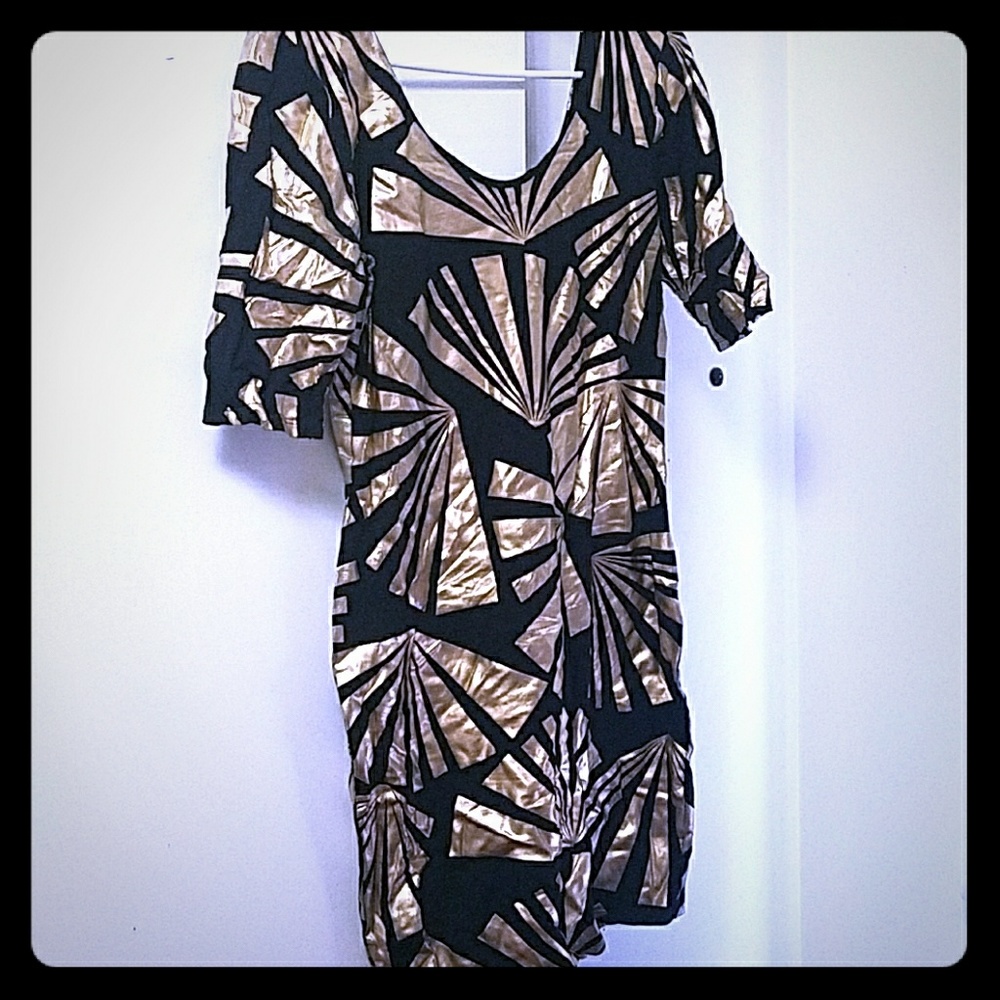 Gorgeous black & Gold bebe dress