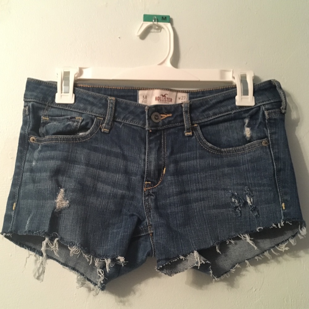 Mid-rise distressed Hollister cutoffs