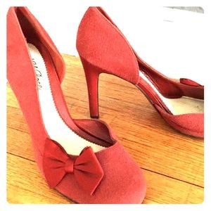 Burnt orange high heel shoes