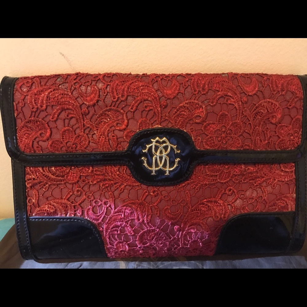 Roberto cavalli distressed clutch