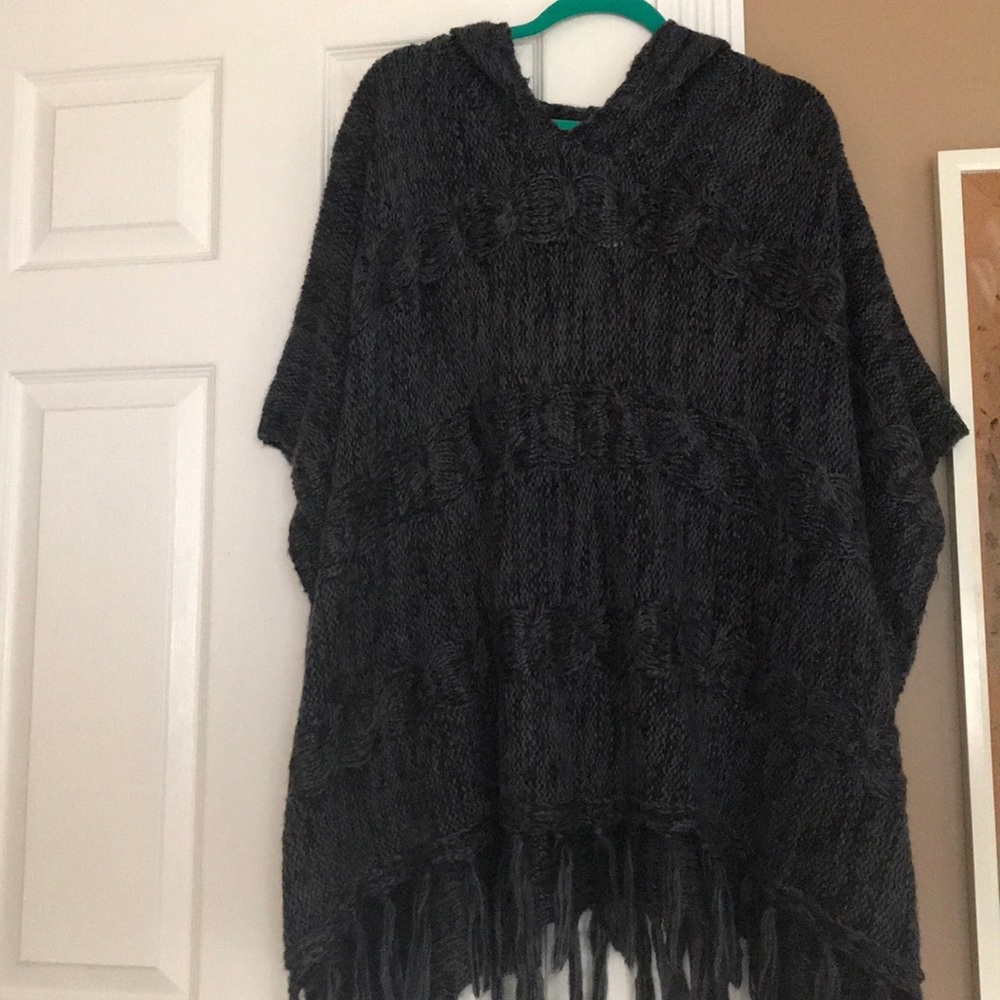 Garage black and blue knit poncho with hood.