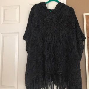 Garage black and blue knit poncho with hood.