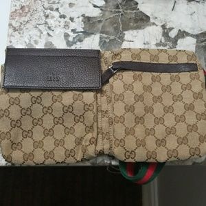 Monogrammed Gucci Belt Bag with classic belt color