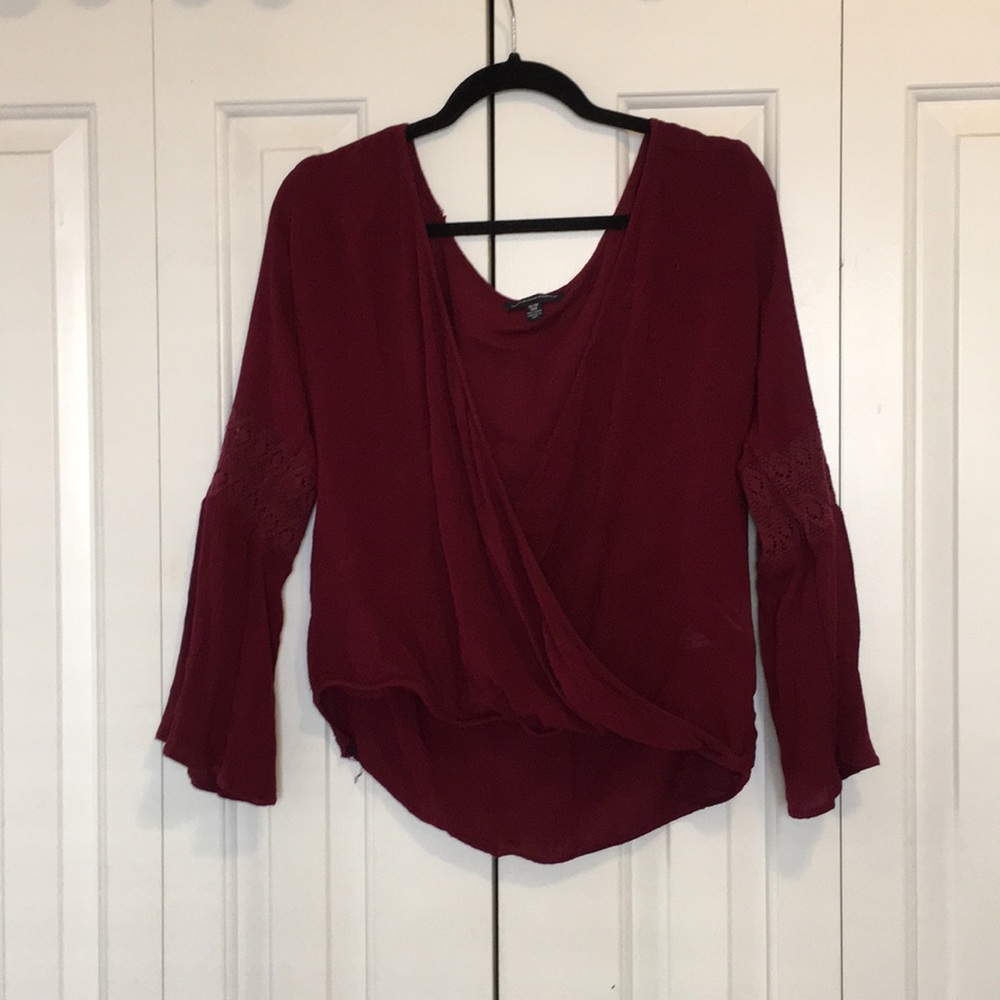 AE burgundy surplice blouse bell sleeves