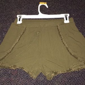 Green embellished shorts