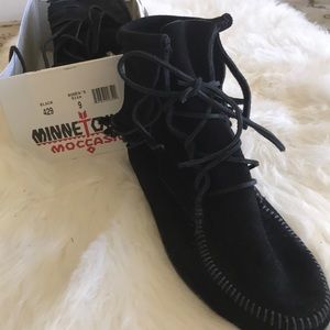 Black moccasin boots
