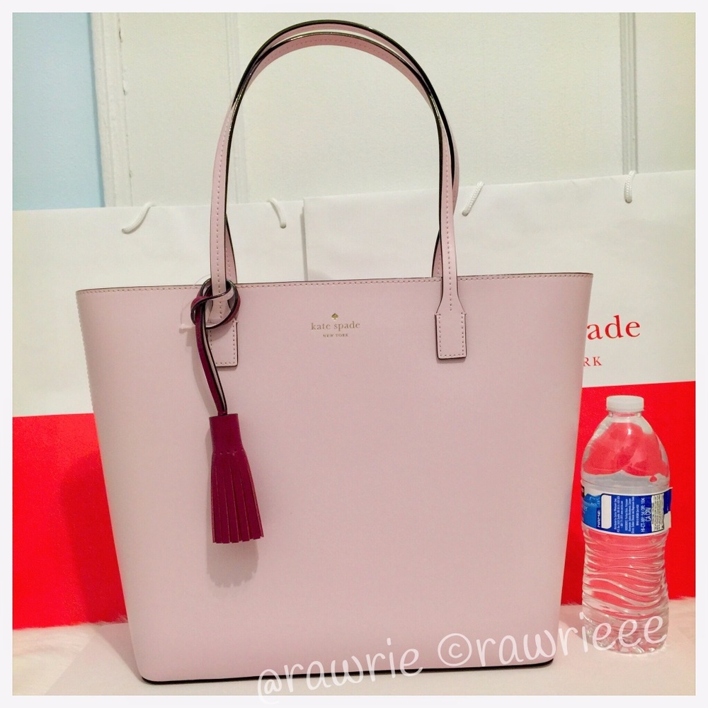 New Kate Spade leather tote with tassel